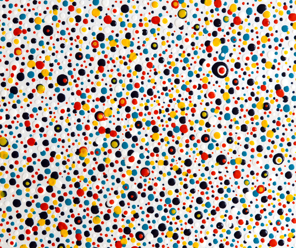 Colourful polka dots pattern on white background.