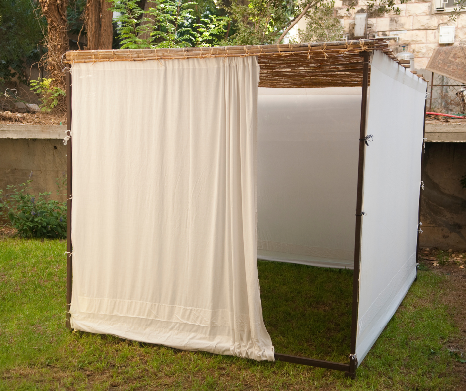 Traditional outdoor Sukkah with fabric walls.