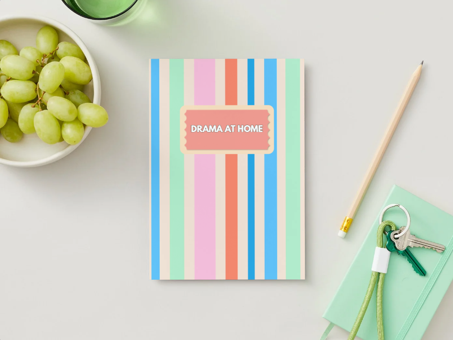Pastel striped notebook with grapes and stationery